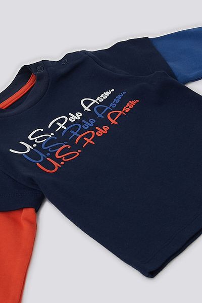 U.S. Polo Assn. طقم أطفال مكون من قطعتين بتفاصيل ذراع مزخرفة باللون الأزرق الداكن من U.S. Polo Assn