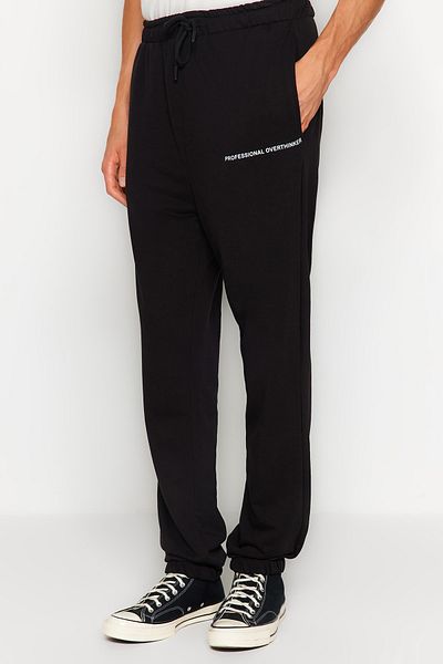 Trendyol Collection Oversize Μαύρο Jogger Sweatpants με μίνιμαλ σχέδια - TMNAW24EA00000
