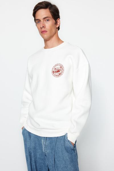Trendyol Collection Trópusi nyomott ekrü pamut oversize pulóver - polár TMNAW24SW00125