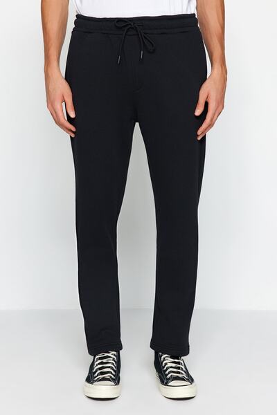 Trendyol Collection Μαύρο βαμβακερό παντελόνι με ανοιχτό πόδι - κανονική εφαρμογή TMNAW24EA00011