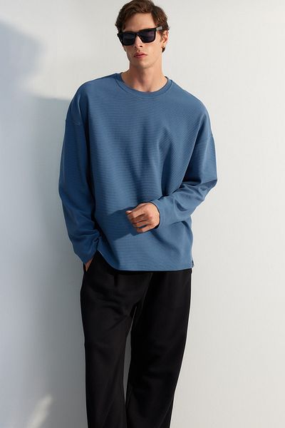 Trendyol Collection Modrá oversize texturovaná bavlněná mikina - limitovaná edice TMNAW24SW00073
