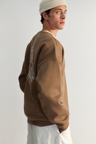 Trendyol Collection Кафява широка блуза с флорални бродерии, подплата от флис и топла памучна подплата TMNAW24SW00012