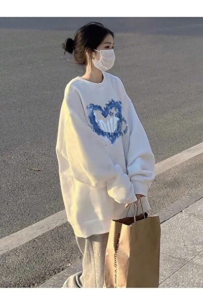 Adrift بلوفر بأكتاف منسدلة على شكل قلب باللون الأبيض