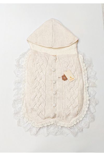 a baby Baby Swaddle Lined Lamb Wool Lacy Knitted