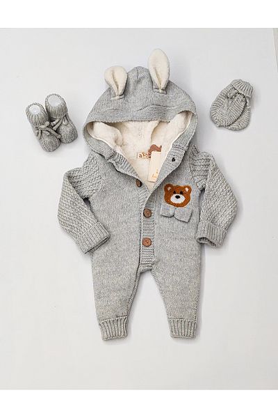a baby Baby Jumpsuit Lamb Lined booties and gloves with hairpins
