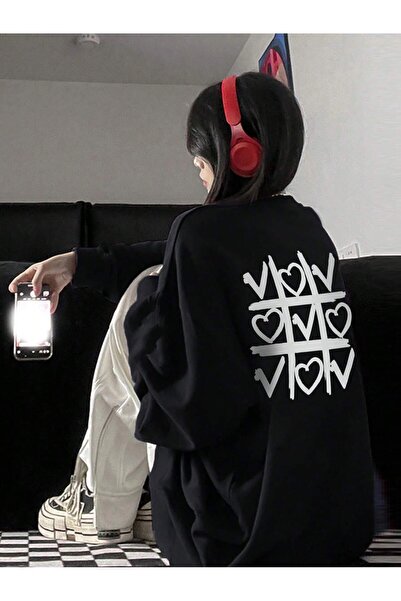 Adrift بلوفر بأكتاف منسدلة على شكل قلب باللون الأسود