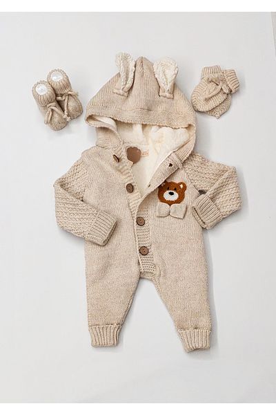 a baby Baby Jumpsuit Lamb Lined booties and gloves with hairpins