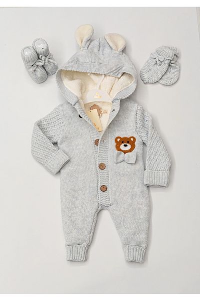 a baby Baby Jumpsuit Lamb Lined booties and gloves with hairpins
