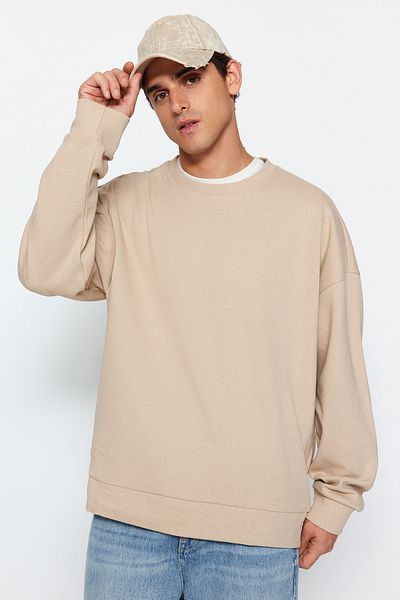 Trendyol Collection Beigefarbenes, übergroßes/breit geschnittenes, weiches, gebürstetes Thessaloniki-Sweatshirt mit Rundhalsausschnitt TMNAW24SW00057
