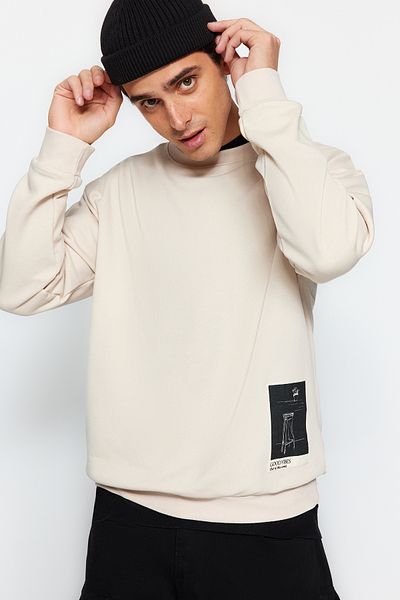 Trendyol Collection Béžová mikina oversize/široký střih Crew Neck Art Motiv Aplikovaný fleece uvnitř Tmnaw24Sw00038