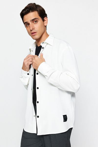 Trendyol Collection Flexible and Comfortable Ecru Knitted Shirt - Regular Fit with Label Detail and Snap Closure TMNAW24GO00031