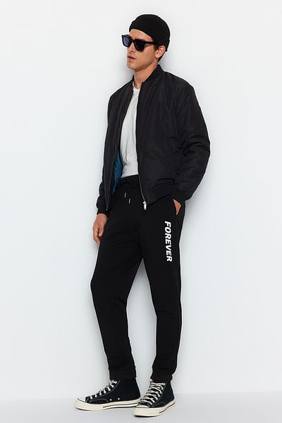 Trendyol Collection Printed Black Elastic Sweatpants - Regular Fit TMNAW22EA0602