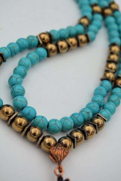 Stoneage Turquoise and Hematite and Turquoise Stone Evil Eye and Healing Necklace