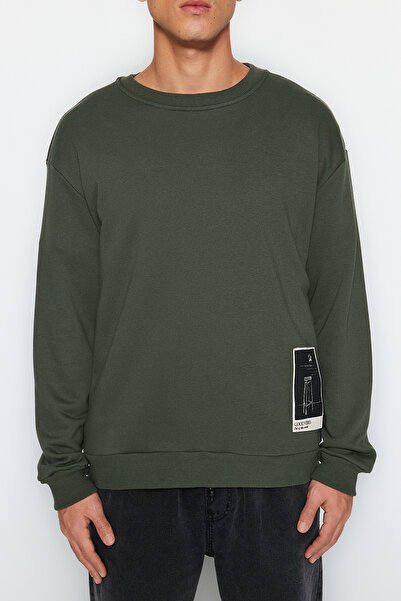 Trendyol Collection Khaki Oversize/Wide Cut Crew Neck Art Theme Appliqued Fleece Inside Sweatshirt Tmnaw24Sw00038