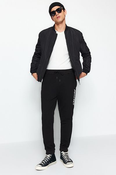 Trendyol Collection Printed Black Elastic Sweatpants - Regular Fit TMNAW22EA0602