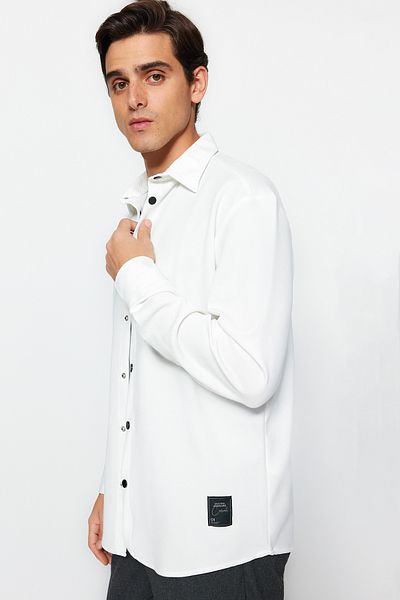 Trendyol Collection Flexible and Comfortable Ecru Knitted Shirt - Regular Fit with Label Detail and Snap Closure TMNAW24GO00031