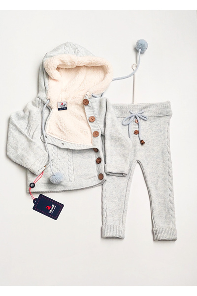 a baby Baby Knitwear Cardigan Set Lined with Pompom