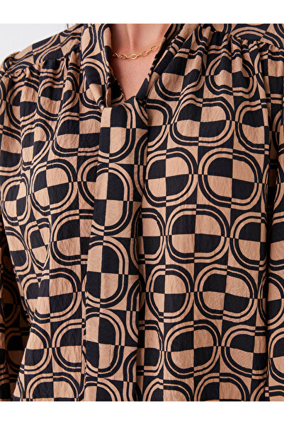 LC Waikiki Bağlamalı Yaka Desenli Uzun Kollu Oversize Kadın Bluz