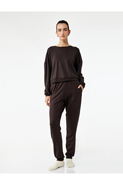 Долен дел од пижами тип џогер од модал, со џебови и Slim Fit крој