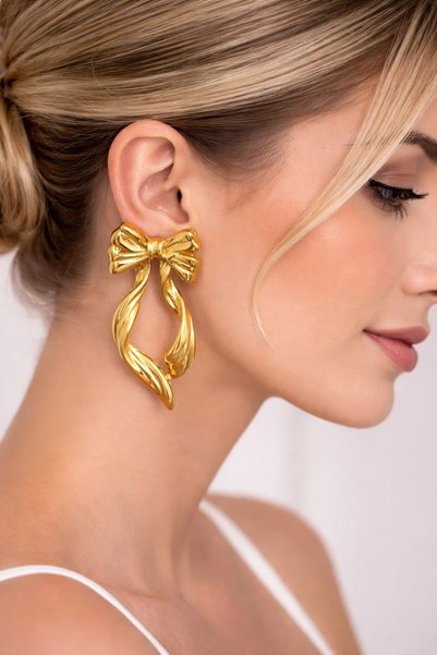 Women's Yellow Steel Big Bow Nail Earrings - Stylish Design