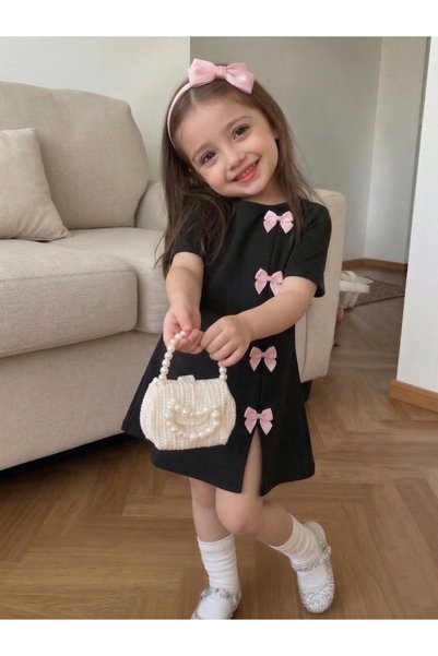 Girl's Black Mini Dress with Pink Bow Detail, Modern Design