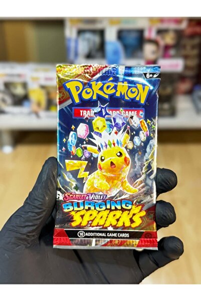 The Pokemon TCG Surging Sparks Booster единечно пакување