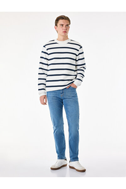 Фармерки со нормален струк, џебови и памучен Slim Fit крој - Brad Jean