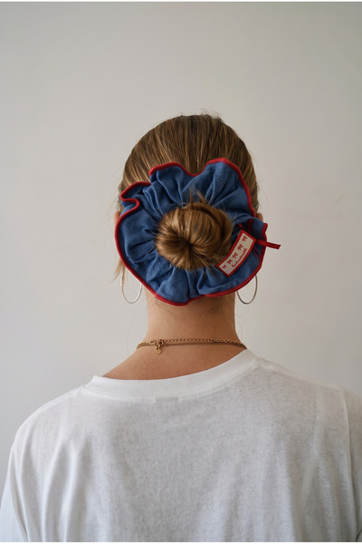 Navy blue denim look bow tag elastic bun buckle