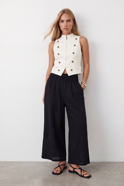 Women's black high-waisted trousers with lace-up detail alc-x15592