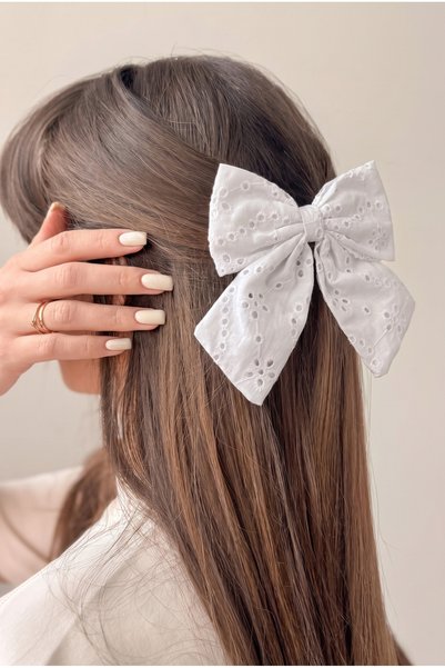 Automated Scalloped White Bow Buckle