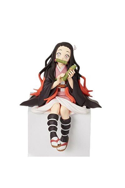 Nezuko фигура аниме Demon статуа играчка во седечка положба како јаде оризови топчиња 15 cm