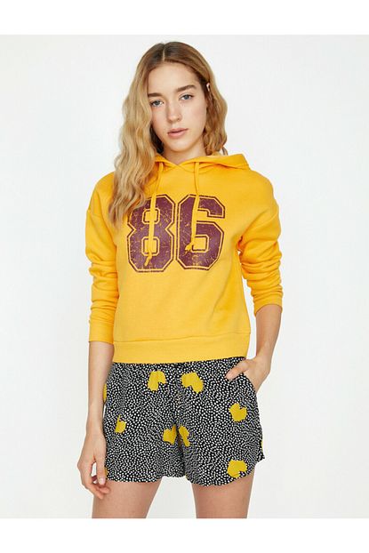 Koton Kadin Sari Yazili Baskili Sweatshirt Trendyol
