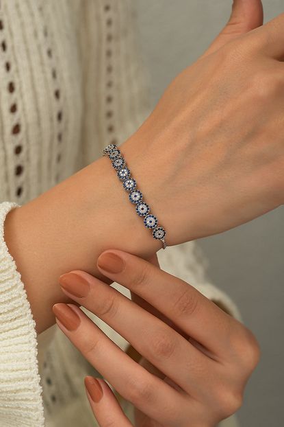 https www trendyol com papatya silver nazargoz asansor bileklik nano zirkon tasli rodyum kaplama gumus p 41715674