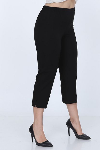 https www trendyol com gul moda kadin buyuk beden kapri kumas siyah g010 p 38430954