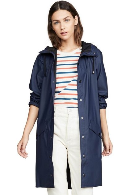 Waterproof jacket is cut from Rains’ signature PU fabric and features ultrasonically welded seams.