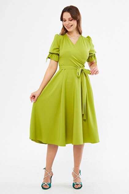 green emerald velvet dress Iris Maxi Dress in Pistachio Green main image 1
