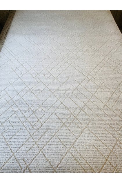 Bej rengi yün salon halısı