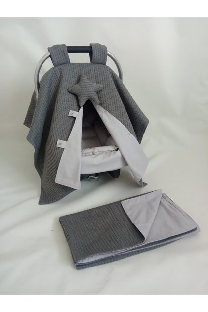 Reversible stroller cover, stroller cushion, stroller sheet and Blanket.