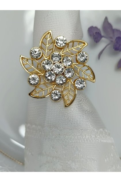 6-piece brooch, gold napkin ring.