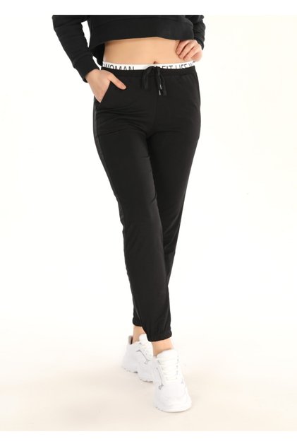 Kadın Siyah Lastikli Dar Paça Lastikli Bel Yan Şerit Detaylı Slim Fit Eşofman Altı Pogi