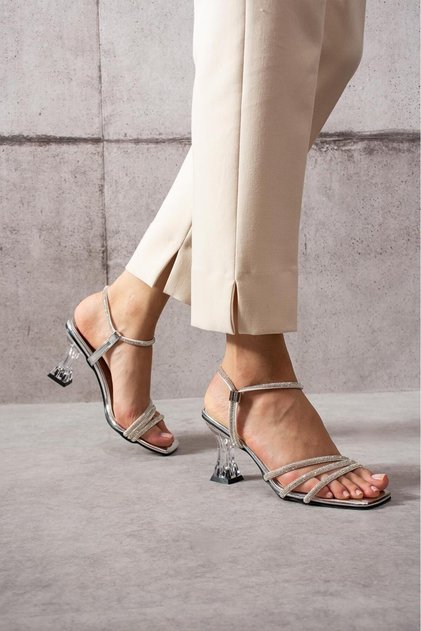 Around stone detailed high-heeled women's evening shoes.
