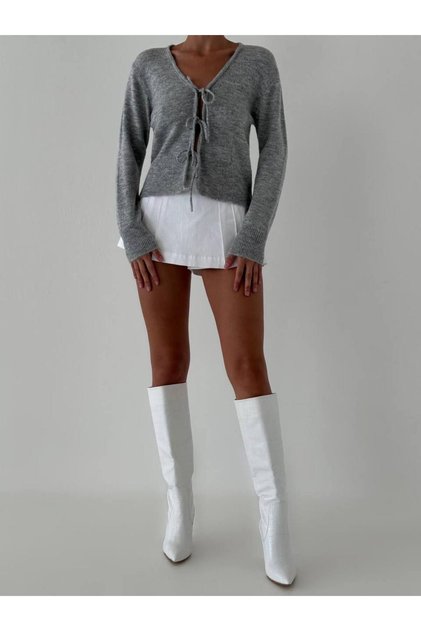 Women's grey knit cardigan with lace-up front detail and soft texture