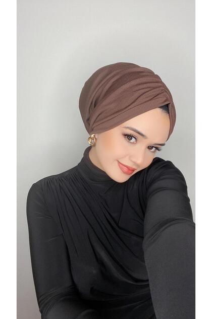 ملابس نسائية محتشمة من قماش التفتيل بتصميم بيري