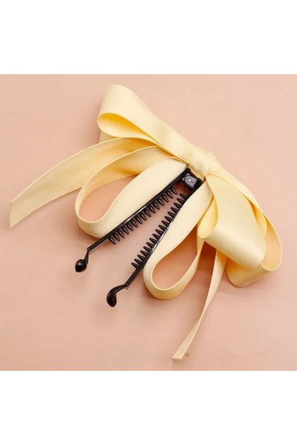 Oversized bow banana buckle