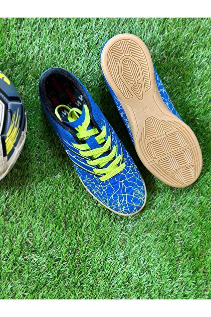 indoor soccer shoes on grass