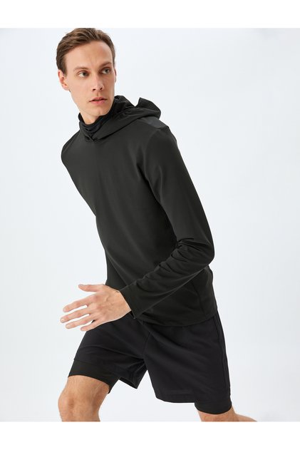 Parachute fabric pocket detail drawstring sport shorts with leggings.
