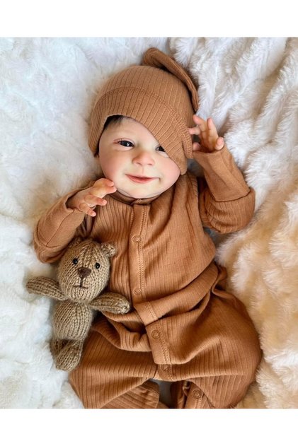 دمية طفل حديث الولادة NPK مقاس 49 سم، Sebastian، بجسم ناعم وملمس واقعي ثلاثي الأبعاد