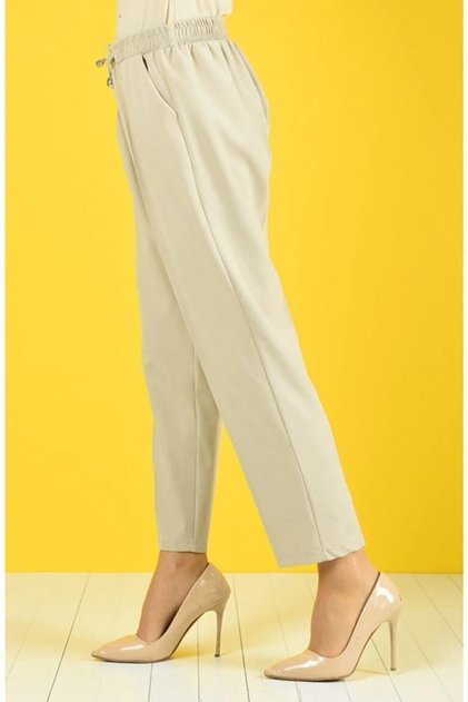 Pantaloni de damă cu picioare de morcov bej de mărime mare