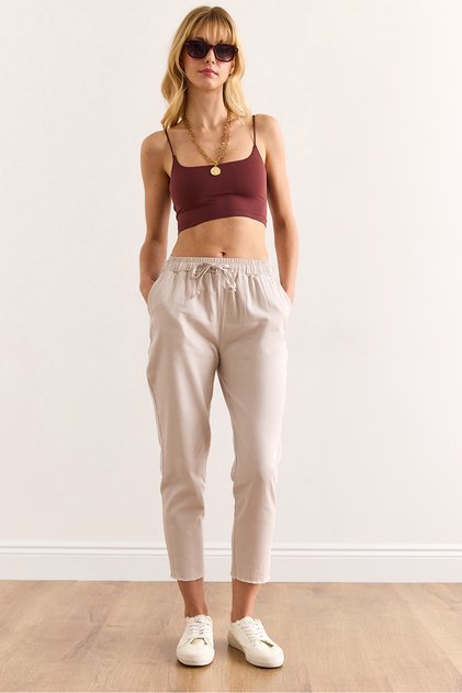 Women's Stone Waist Elastic Tasseled Gabardine Carrot Trousers Pnt-19000343