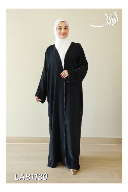 Ladies Nida Fabric Abaya Black abaya with intricate detailing on sleeves and body.